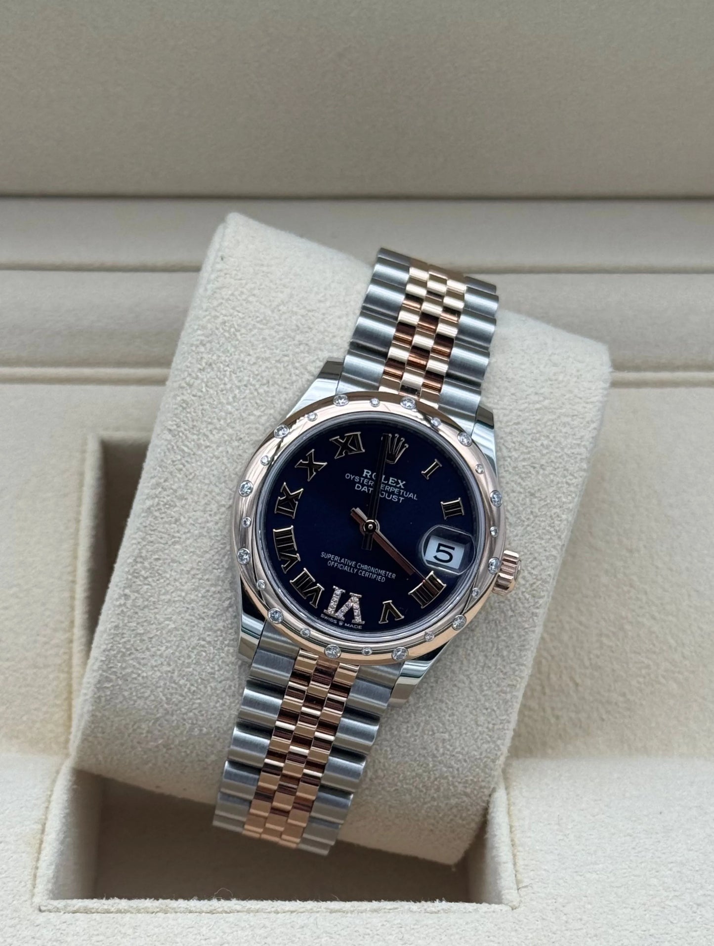 Rolex Datejust 31mm Steel and Rose Gold with Aubergine dial and diamond markers, 2022, full set, like new condition.