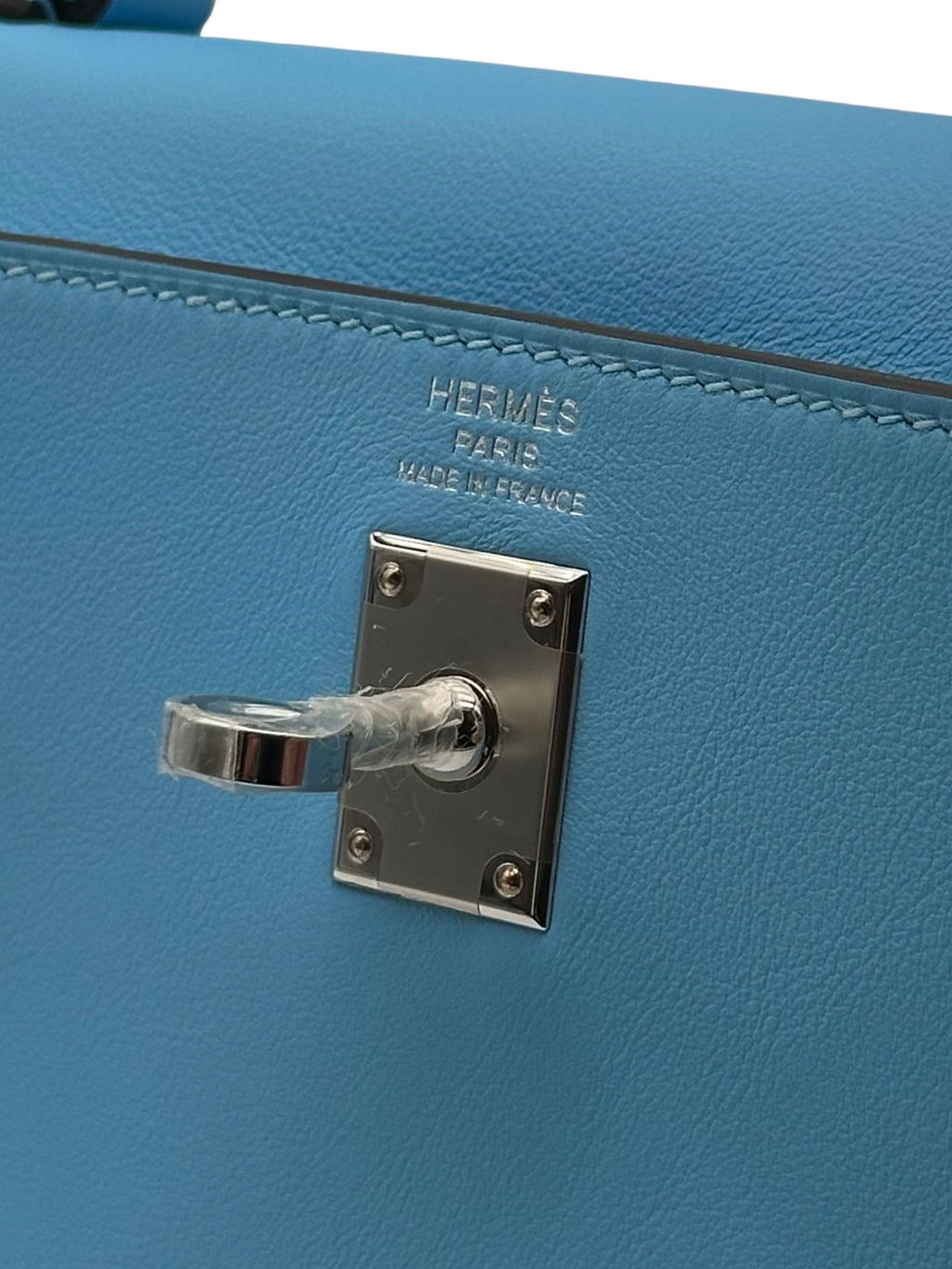 Hermès Kelly 25 Swift Celeste con herrajes de paladio