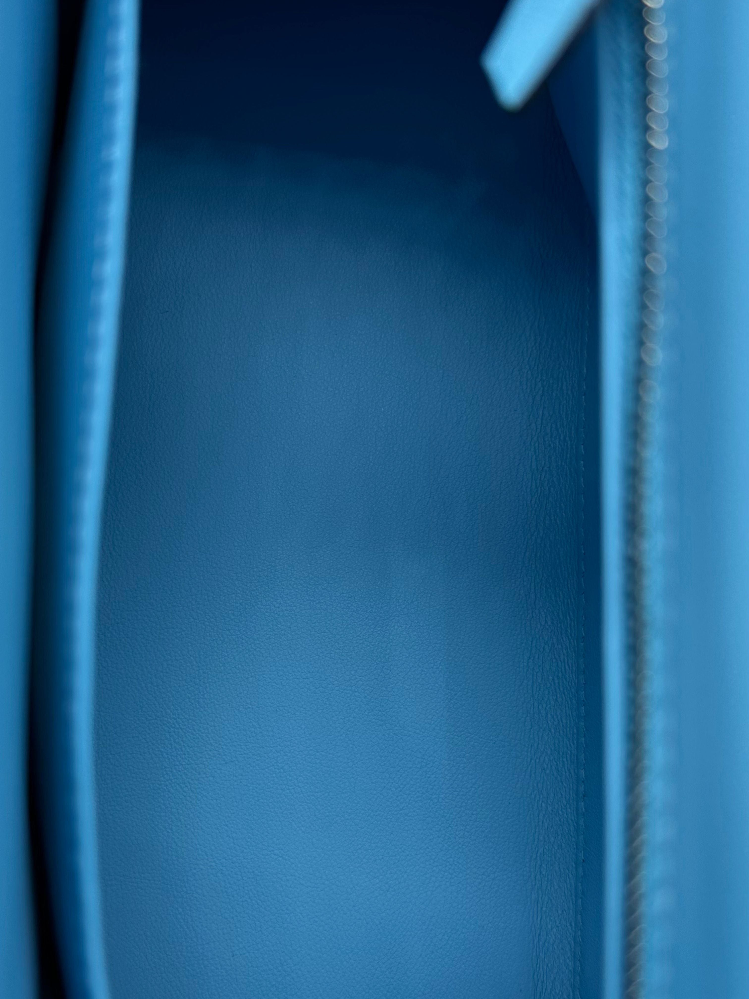 Hermès Kelly 25 Swift Celeste con herrajes de paladio