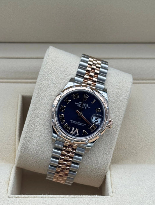 Rolex Datejust 31mm Steel and Rose Gold with Aubergine dial and diamond markers, 2022, full set, like new condition.